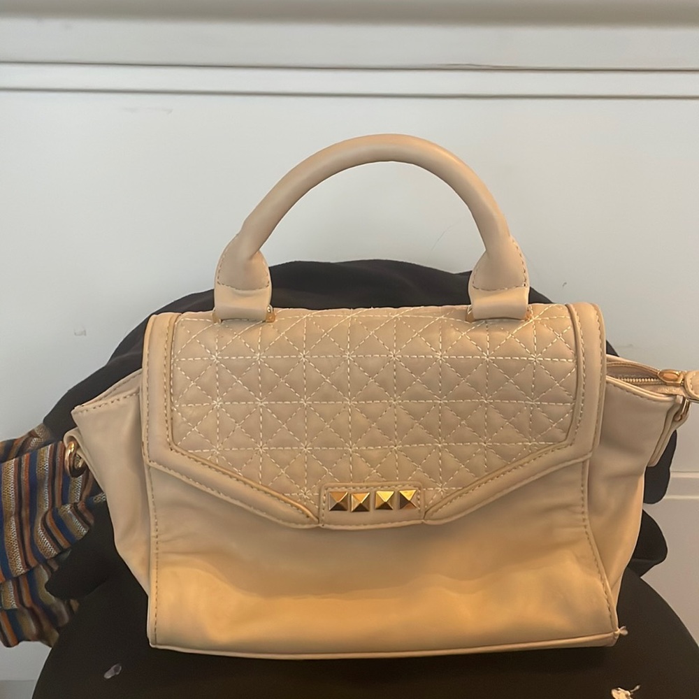 Mint condition beige purse with good accents